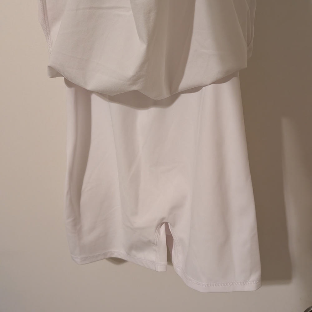 Elegant White Sleeveless Tennis Dress - Picture 2 of 5
